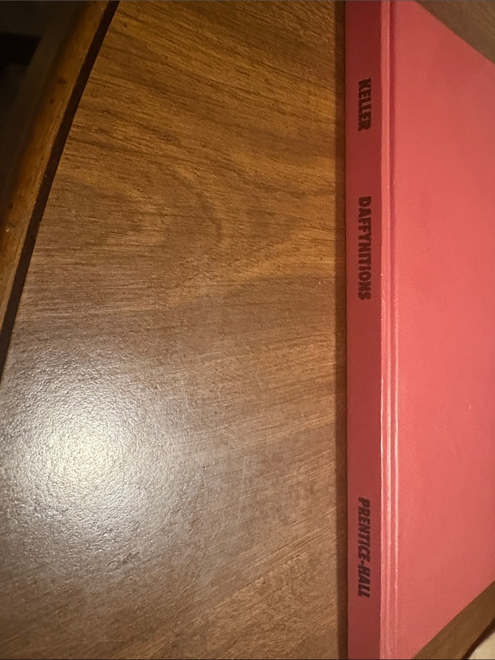 Red Hardcover Book by Keller